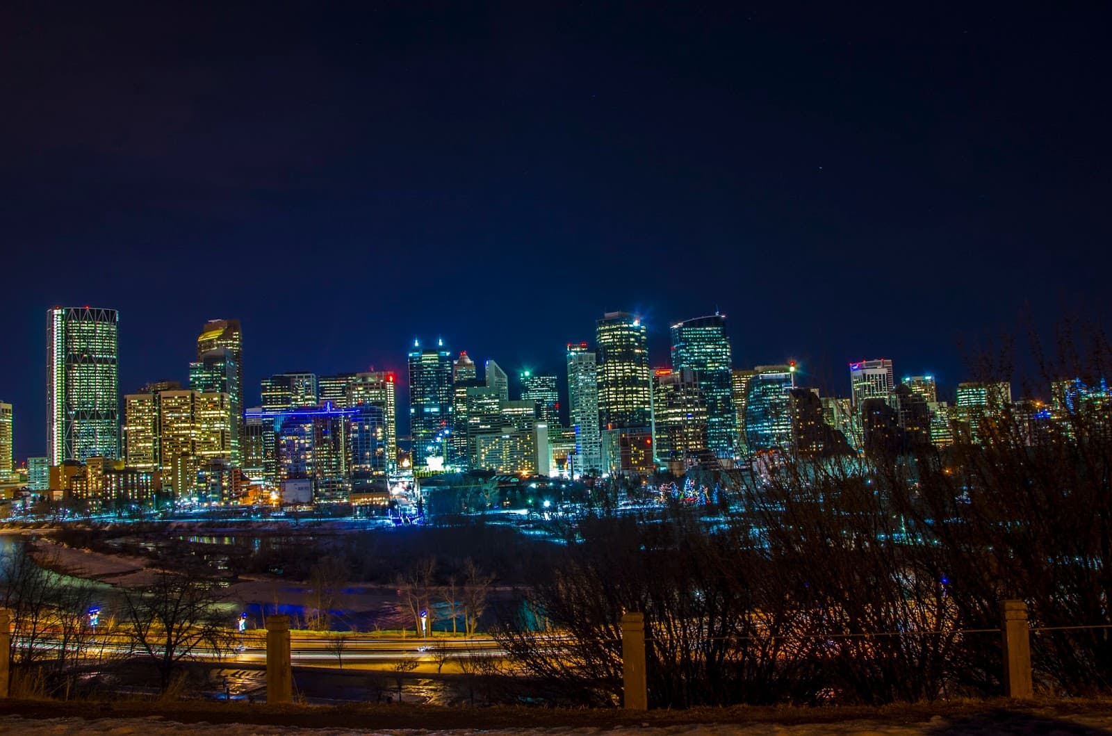 Calgary skyline with downtown towers and Rocky Mountain foothills